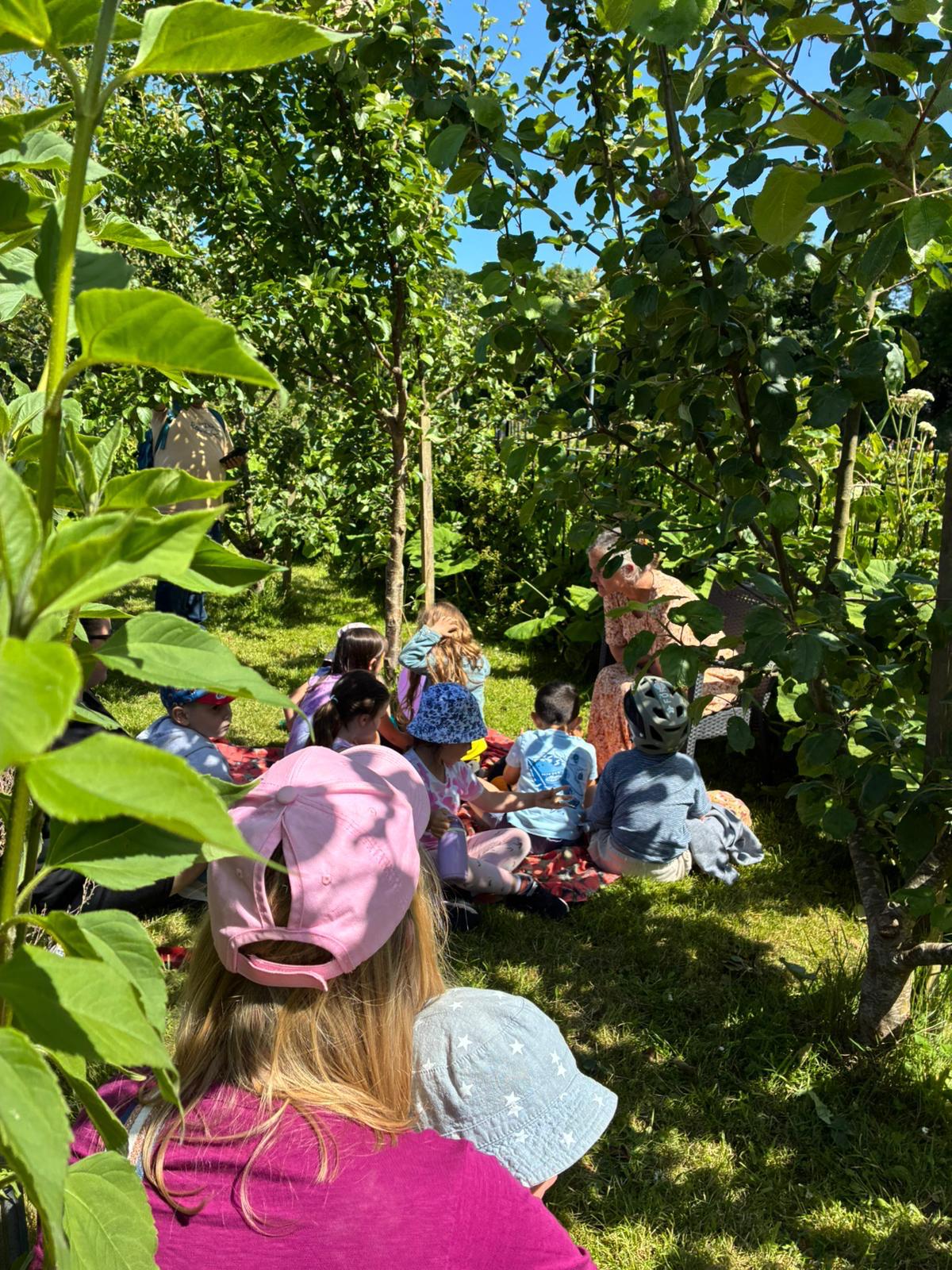 Festival visitors exploring the garden at the 2026 Wild Bee Festival